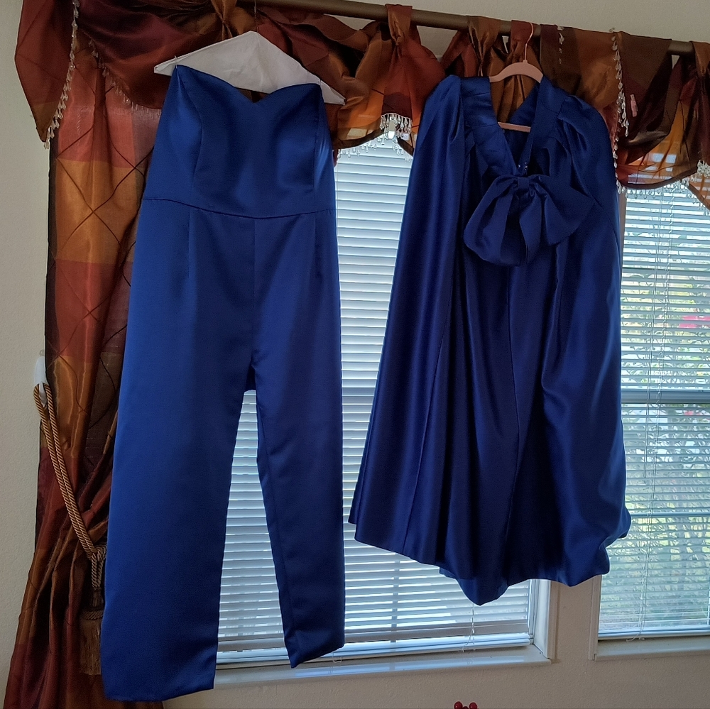 This is a royal blue jumpsuit with a train.  It is bareback to the waist.